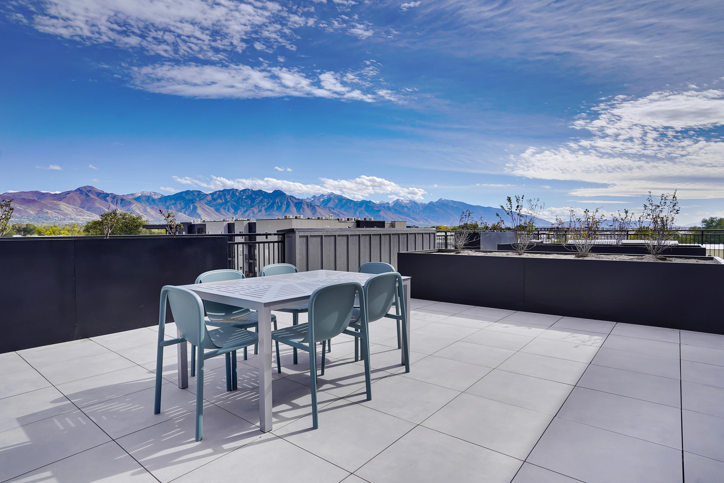 Rooftop terrace with mountain views at The Whitney apartments in Salt Lake City, Utah