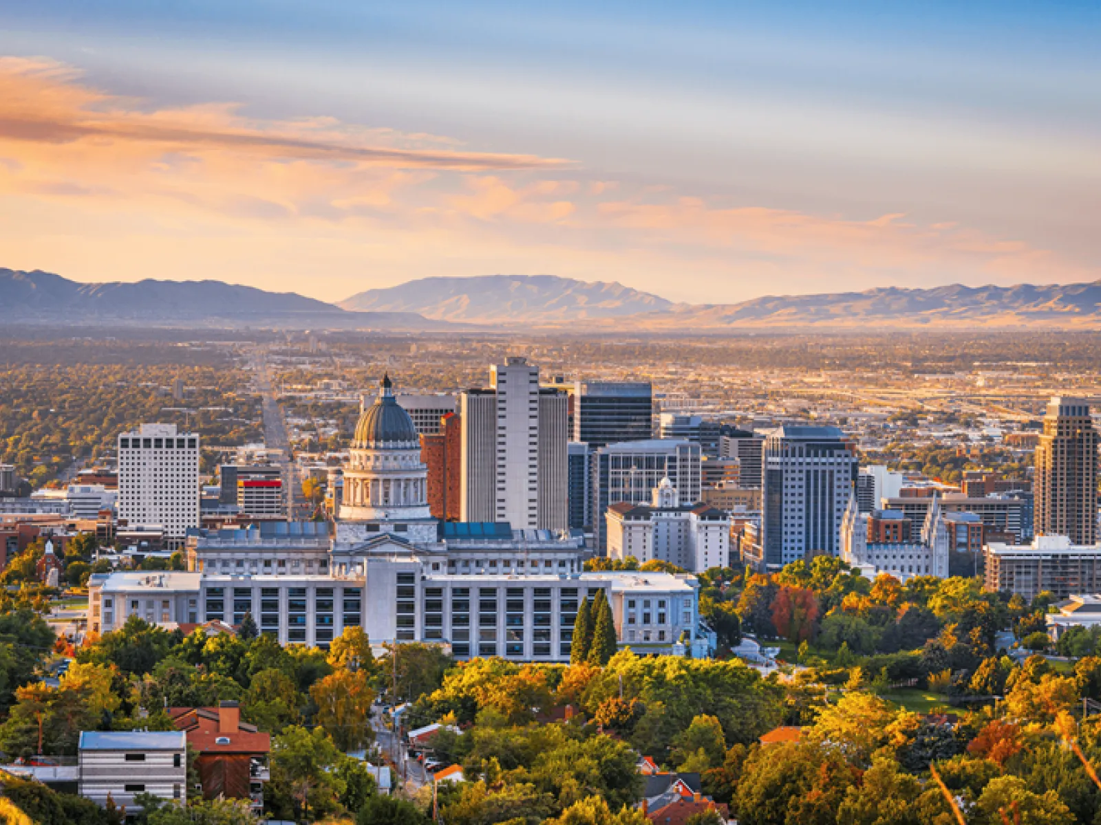 Salt Lake City skyline with mountain views near The Whitney apartments in Utah.